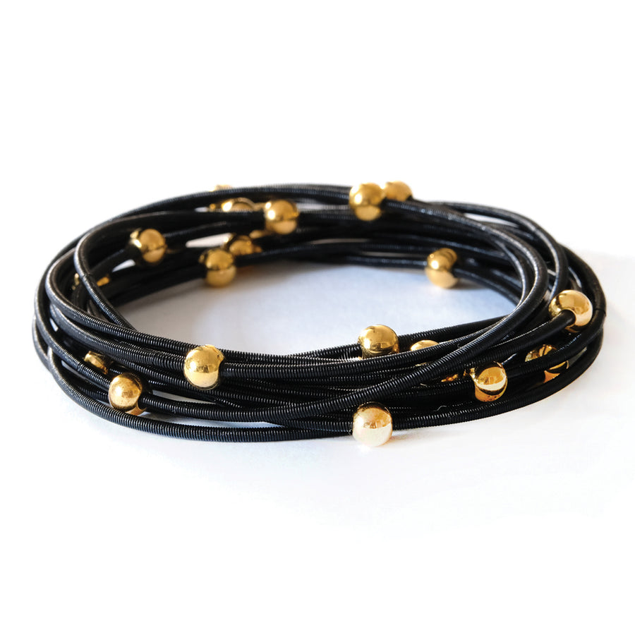 Saturn Bracelets - Black with gold beads