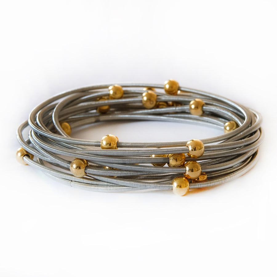 Saturn Bracelets - Dark silver with gold beads